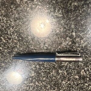 Toyota tundra Pen. Swivel the pen to make it work. Very nice used condition.